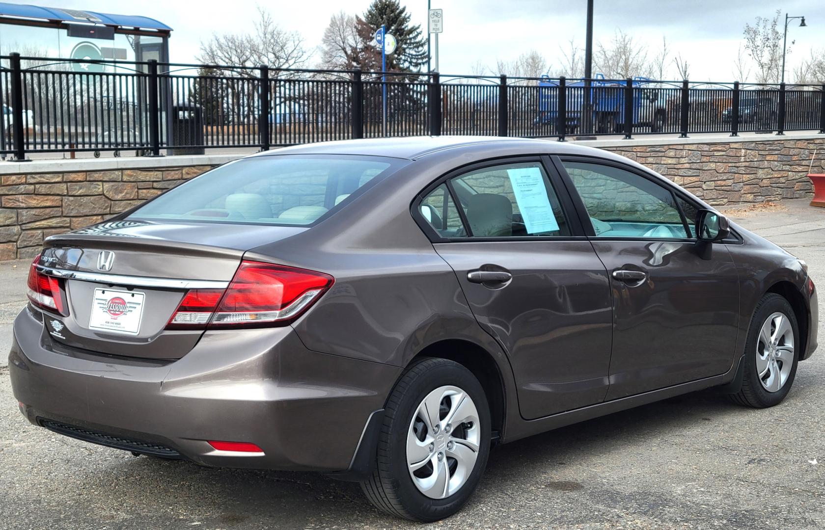 2013 Brown /Tan Honda Civic LX (2HGFB2F57DH) with an 1.8L I4 engine, 5 Speed Automatic transmission, located at 450 N Russell, Missoula, MT, 59801, (406) 543-6600, 46.874496, -114.017433 - Photo#6